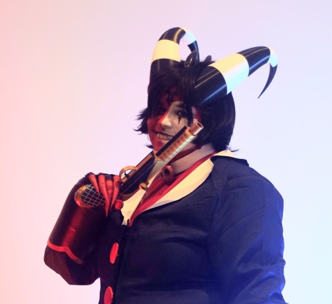 Blitzo costume holding prop gun